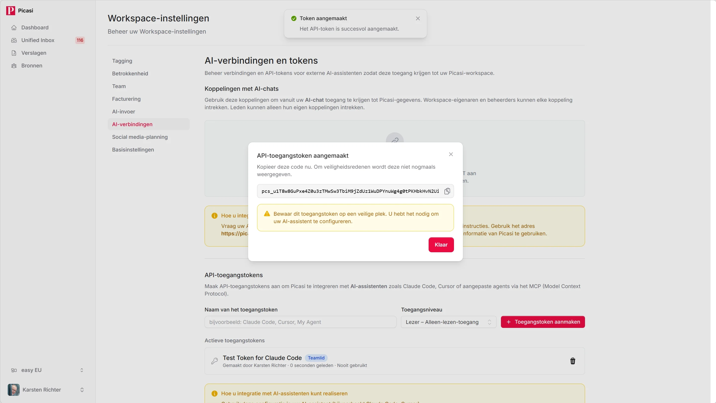 Nieuw aangemaakt API token met volledige tokenstring en kopieerknop